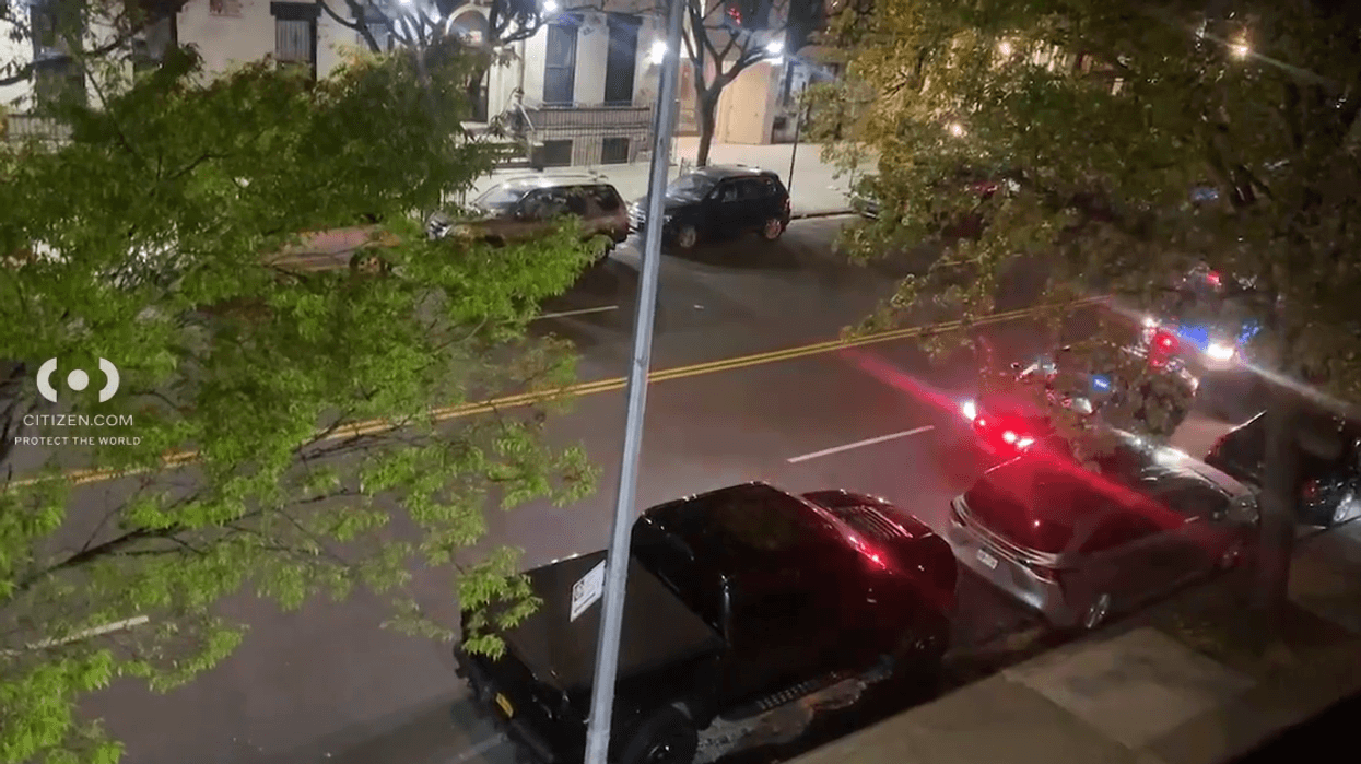 The 61-year-old victim was shot outside her home at 65 Lenox Ave