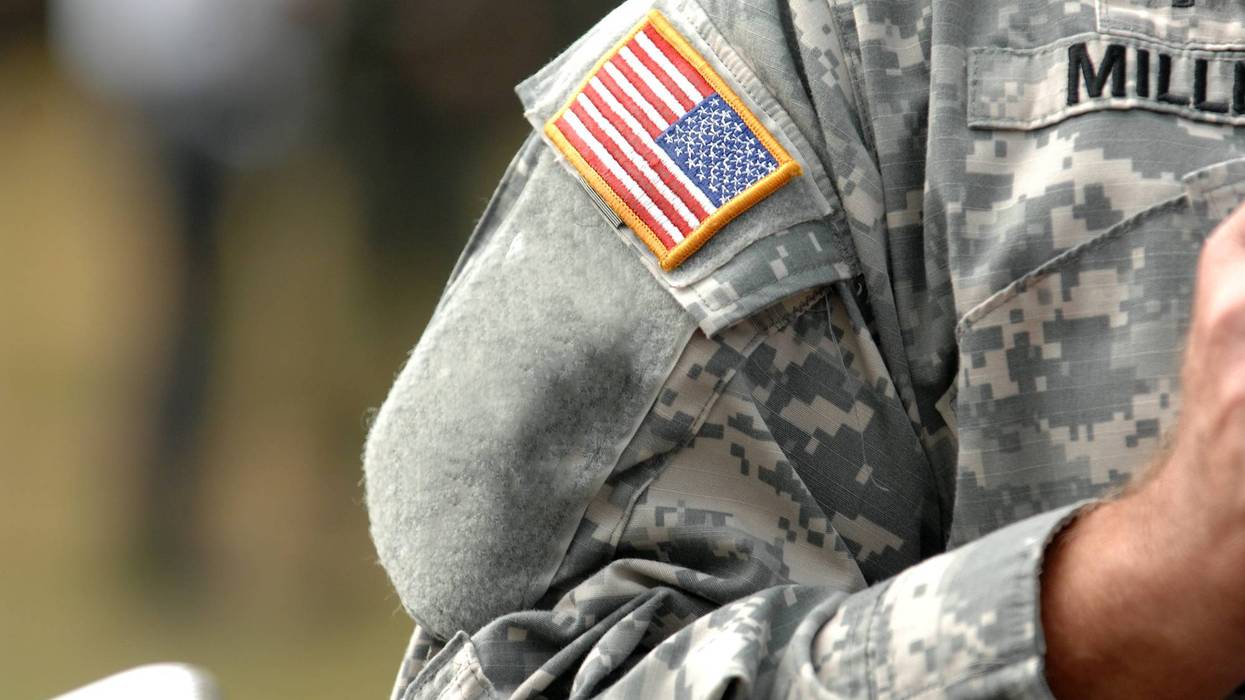 the American flag attached to the American military uniform