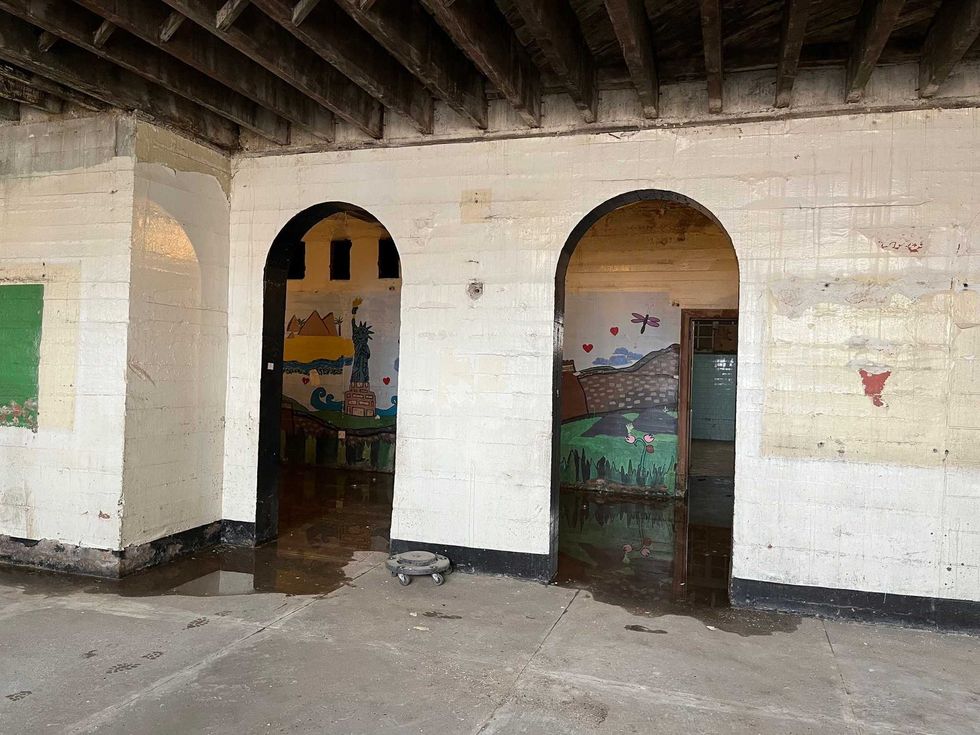 The basement cafeteria still has murals on the walls