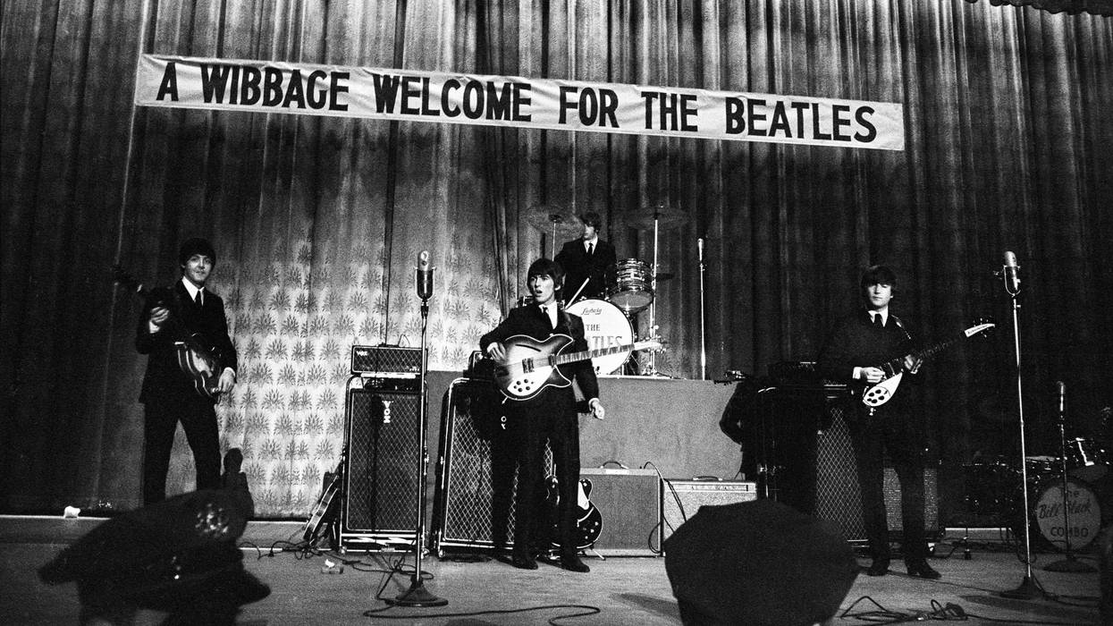 The Beatles perform onstage at Convention Hall in Philadelphia during their first U.S. tour on Sept. 2, 1964