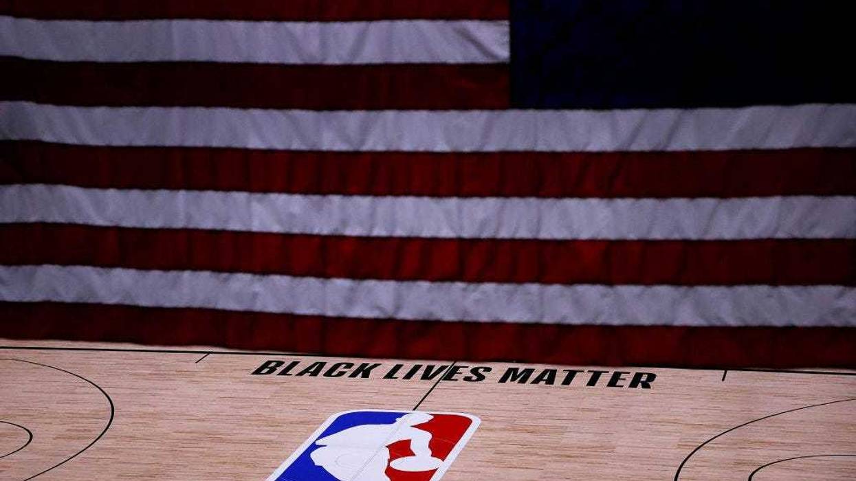 The Black Lives Matter logo is seen on an empty court as all NBA playoff games were postponed today during the 2020 NBA Playoffs at The Field House at ESPN Wide World Of Sports Complex on August 27, 2020 in Lake Buena Vista, Florida. NBA players have reportedly decided to resume the season after their walkout of playoff games on Wednesday to protest the shooting of Jacob Blake in Kenosha, Wisconsin.