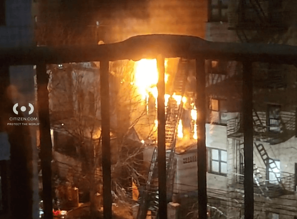 The blaze tore through a Buddhist temple as firefighters struggled to reach the building with a fire hose