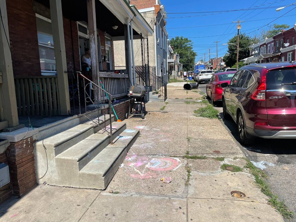 The block on Harrison Street in Frankford where Tylesha Watson was cooking Tuesday night when she was struck by a stray bullet and killed.