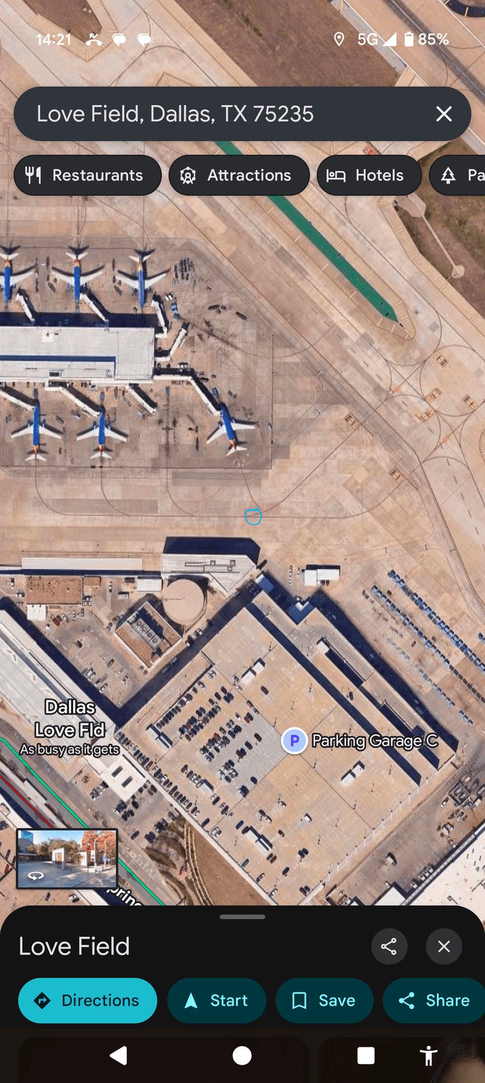 The blue circle marks where on the tarmac the plaque is embedded