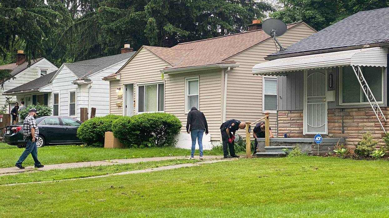 The body of a man found shot dead in front of bushes on the lawn of a home on Detroit's west side may have been involved in a break-in attempt, officials said Tuesday morning.