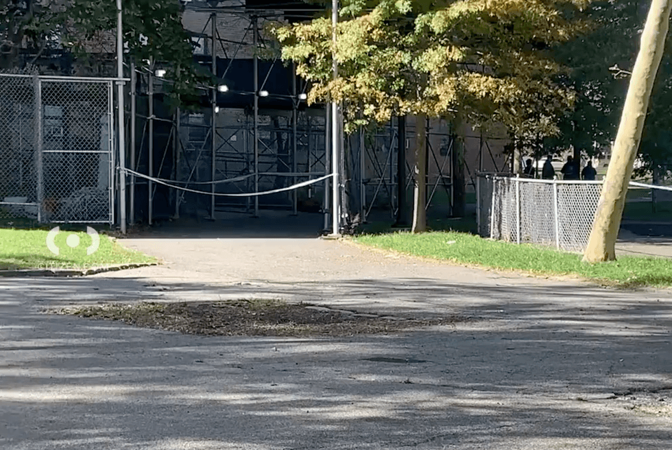 The body was found in the rear of a building at the Castle Hill Houses on Thursday morning