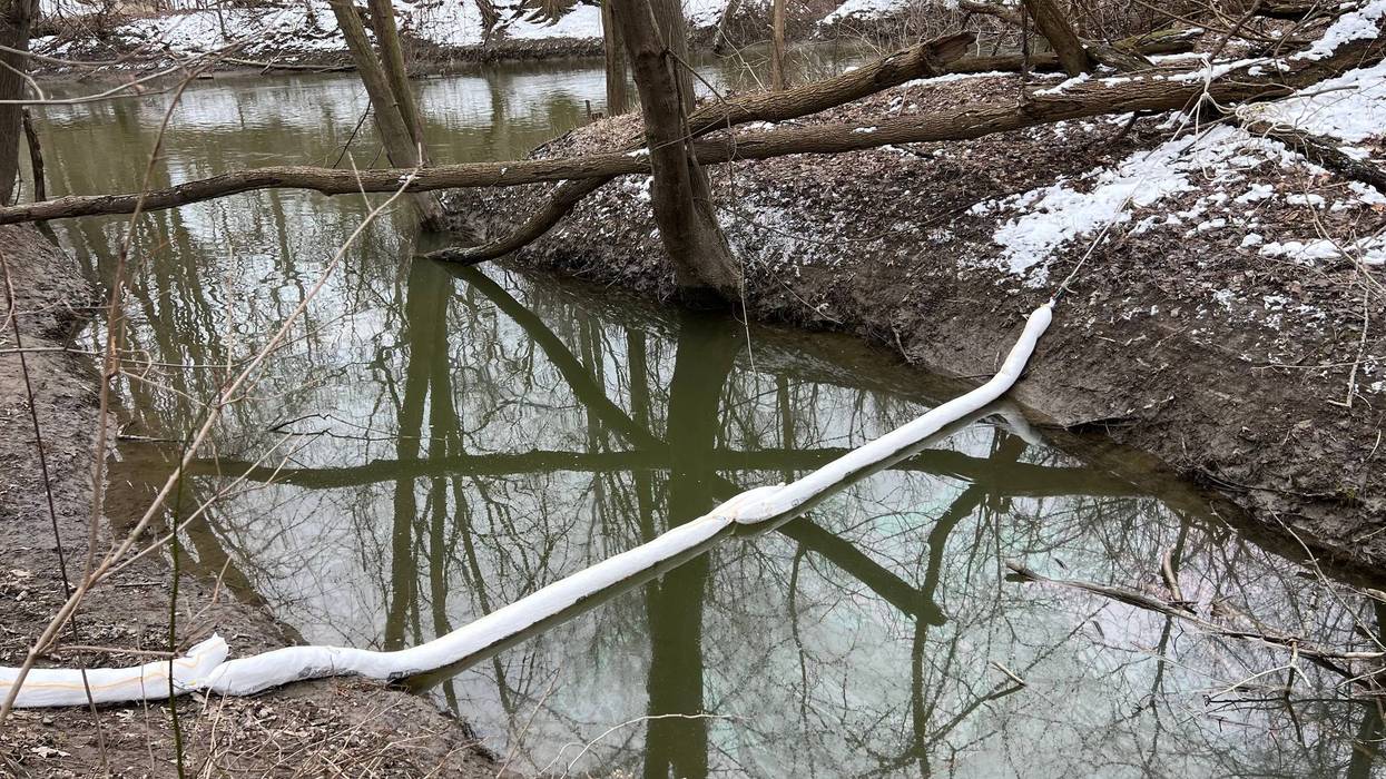The boom placed in the Canal Drain, near Clinton River Road in Clinton Township.