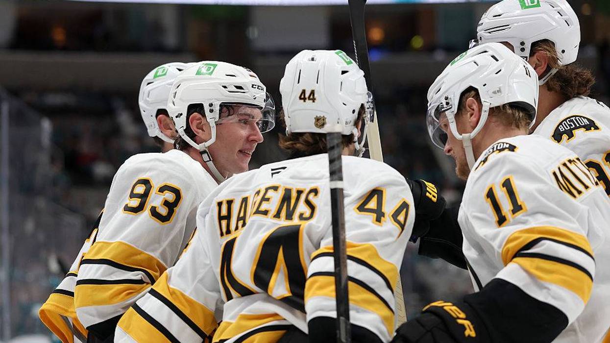 The Boston Bruins celebrate a goal against the San Jose Sharks