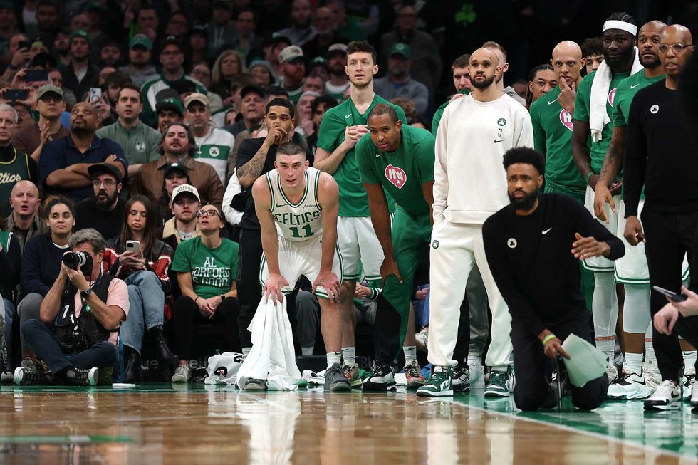 The Boston Celtics bench watches the second half of the game against the Houston Rockets at TD Garden on January 27, 2025 in Boston, Massachusetts.