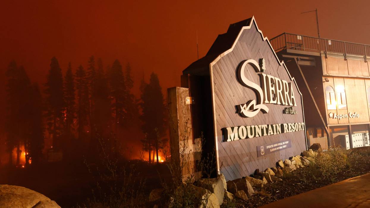 The Caldor Fire burns in trees at the Sierra-at Tahoe ski resort on August 30, 2021 in Twin Bridges, California.