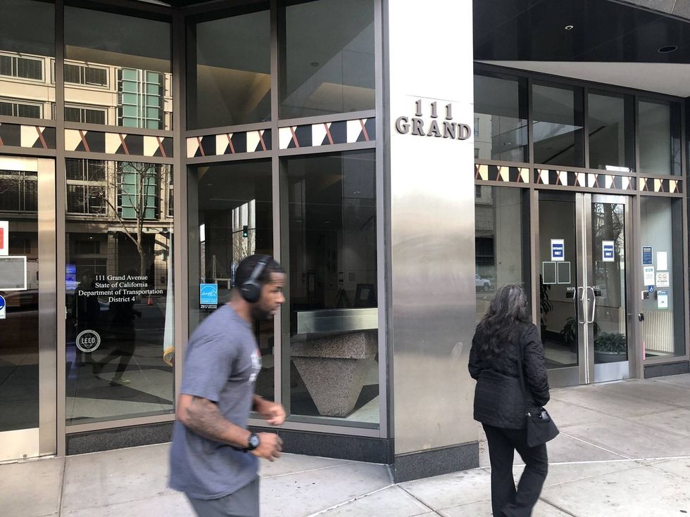 The Caltrans headquarters in Oakland is under evacuation after reports of a gunman were made Wednesday morning.