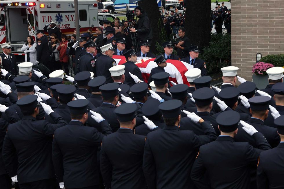 The casket of FDNY Lt. Alison Russo-Elling arrives at the Tilles Center for Performing Arts on Long Island on Oct 5, 2022
