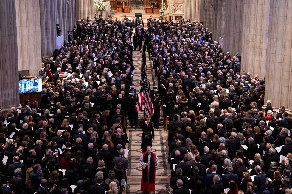 The casket of former President Jimmy Carter is carried out of the National Cathedral in Washington, DC, after his state funeral on January 9, 2025