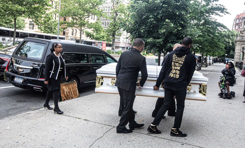 The casket of Jordan Neely is carried into Mount Neboh Baptist Church in Harlem on May 19, 2023