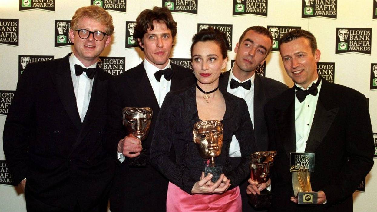 The cast of "Four Weddings and a Funeral" celebrates its British Academy Film Awards win in 1994 in London.The cast has reunited for a short sequel that will air as part of Red Nose Day on May 23 on NBC.