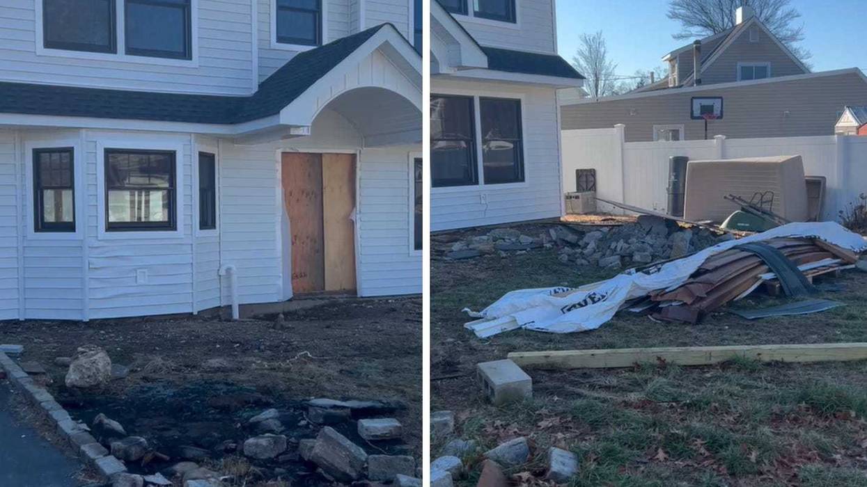 The charred outline of where the porta potty used to stand--and the remains of the toilet itself--were seen outside the home Wednesday