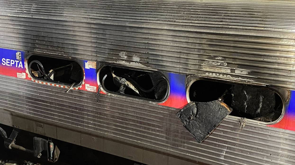 The charred shell of one of the train cars that caught fire back on Feb. 6, 2025.