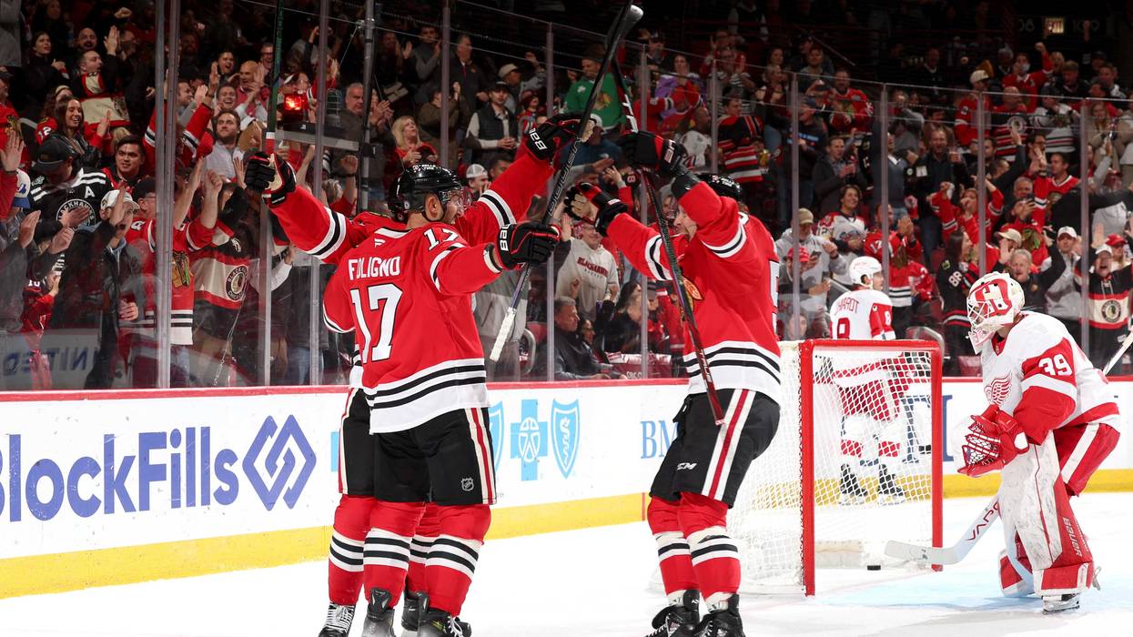 The Chicago Blackhawks celebrate after scoring against the Detroit Red Wings in the second period at the United Center on Nov. 6, 2024.