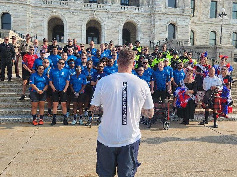 The chief talks to the bikers