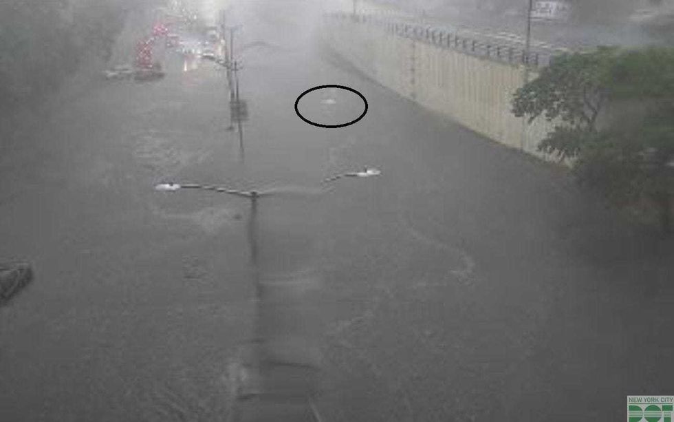 The Clearview Expressway at Northern Boulevard was flooded by 3 p.m. Thursday after inches of rain fell in northern Queens