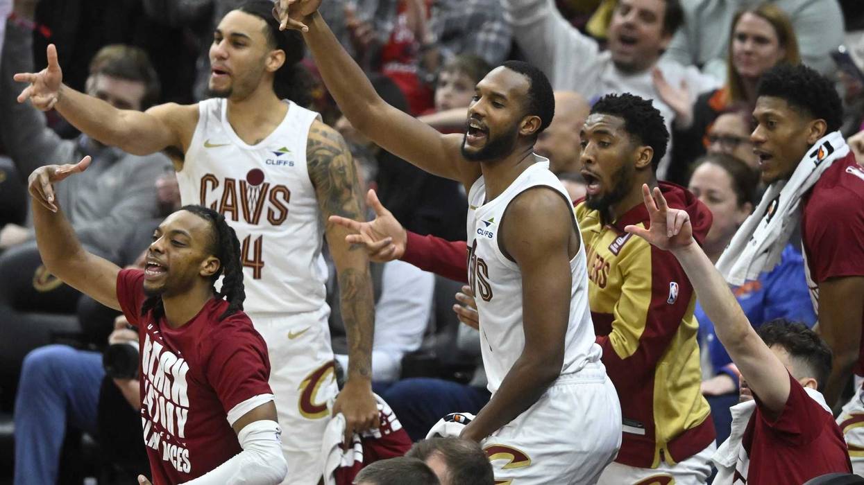 The Cleveland Cavaliers celebrate in the fourth quarter against the Minnesota Timberwolves at Rocket Mortgage FieldHouse.