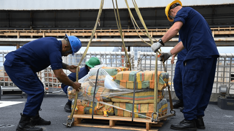 The Coast Guard Cutter Kimball (WMSL-756) crew offloads about 11,300 pounds of cocaine and roughly 4,000 pounds of marijuana worth more than $223 million on March 31, 2022, in San Diego, Calif.