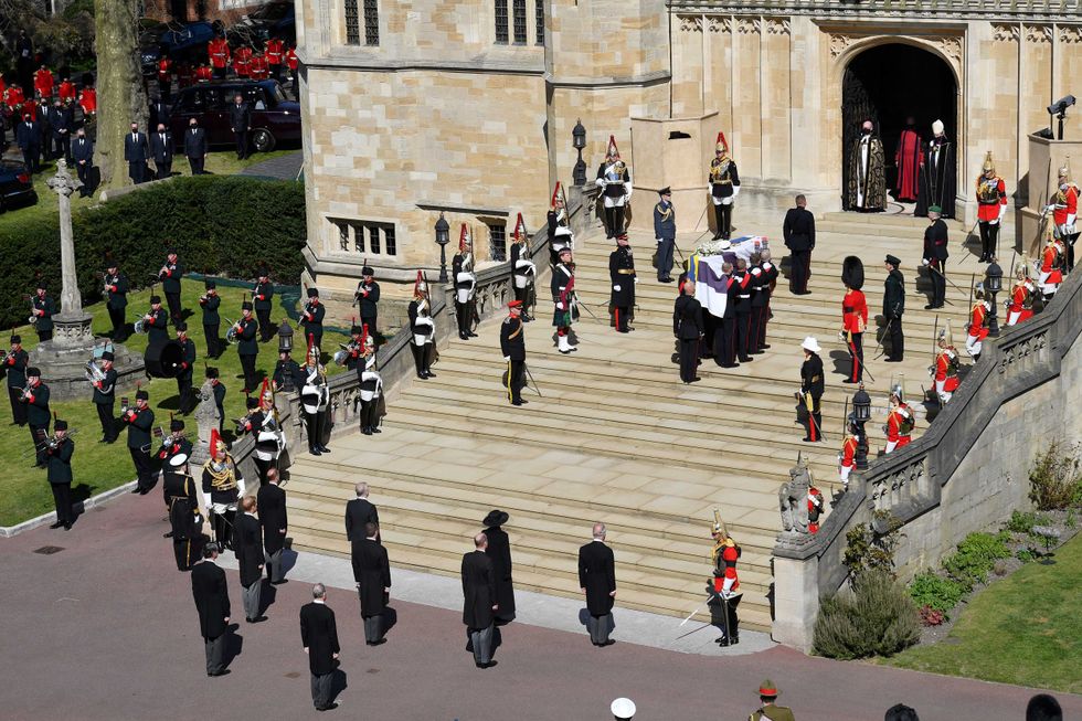 The coffin arrives at St George