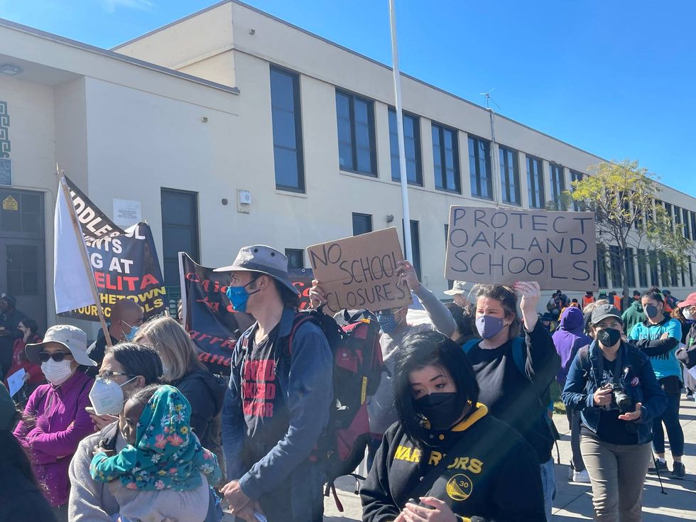 The community is calling on the school board to reverse its decision to close and consolidate schools in Oakland.