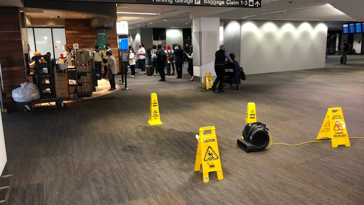 The crime scene after a man allegedly stabbed a CLEAR worker at SFO on Tuesday.