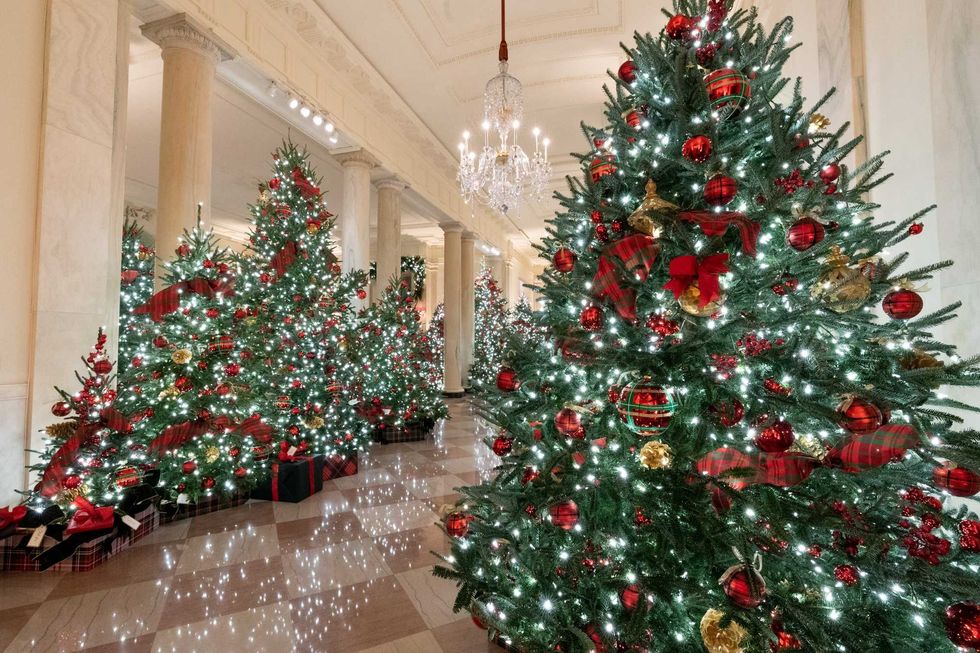 The Cross Hall of the White House is decorated for the Christmas season Sunday, Nov. 29, 2020.