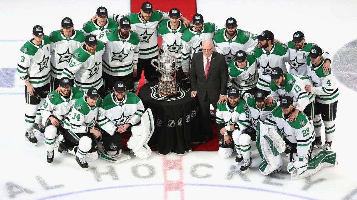 The Dallas Stars with Bill Daly, the deputy commissioner and chief legal officer of the National Hockey League (NHL) and the Clarence S. Campbell Bowl after winning the Western Conference Championship over the Vegas Golden Knights in Game 5.