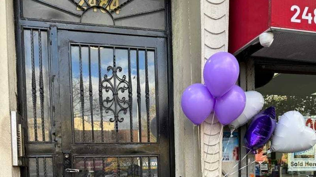The day of Jah'Meik Modlin's death, community members gathered outside his Harlem apartment at 2484 Seventh Ave. for a vigil.