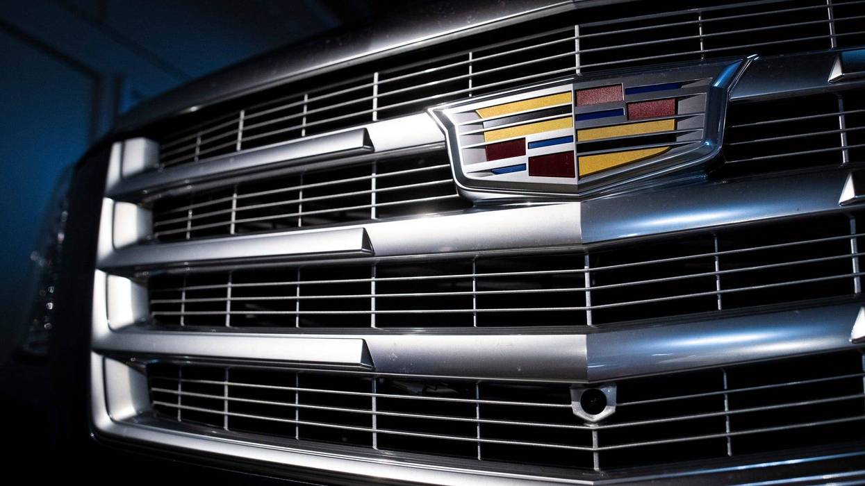 The Detroit automaker announced the recall of roughly 484,000 large SUVs in the U.S. over a problem that can cause the third-row seat belts to malfunction.