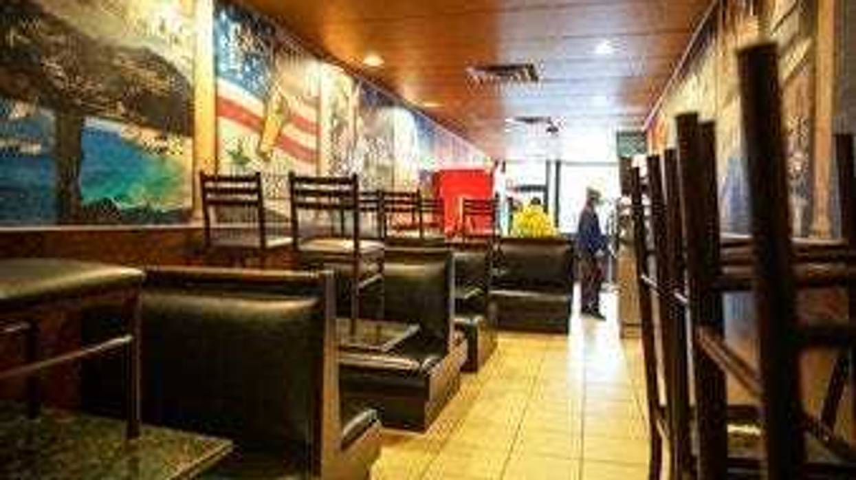 The dining section is closed off at East Side Pockets, a small restaurant near Brown University, Wednesday, March 25, 2020, in Providence, R.I. (AP Photo/David Goldman)