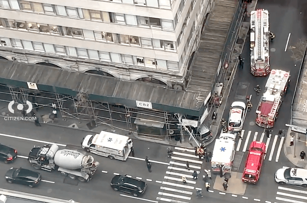 The driver was trying to avoid hitting another car when she swerved and hit the pedestrian and scaffolding, police said