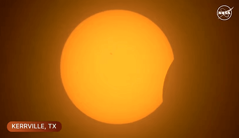 The eclipse underway in Kerrville, Texas, shortly before 1:30 p.m