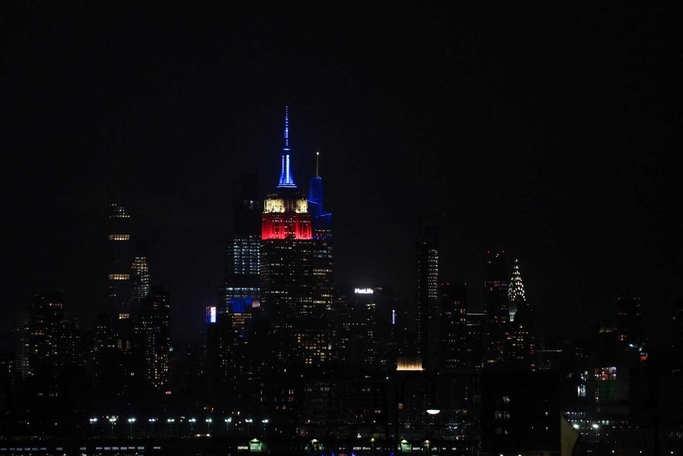The Empire State Building is illuminated in red, white and blue in honor of Jimmy Carter on December 29, 2024