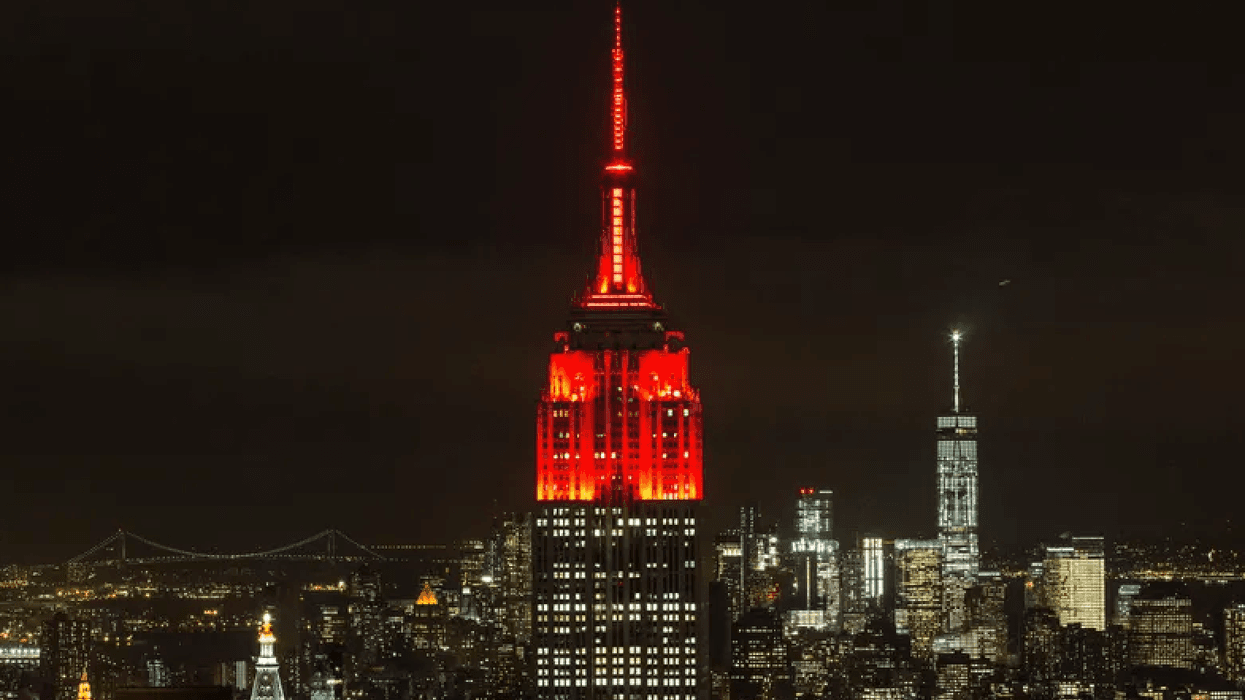 The Empire State building is lit with red lights in honor of World Aids Day on November 30, 2015 in New York City.