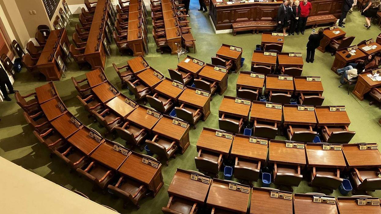 The empty DFL seats as the session began Tuesday in St. Paul.