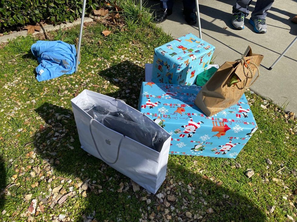 The family of 30-year-old Angelo Quinto put his unopened Christmas presents on the lawn during a Thursday media briefing.