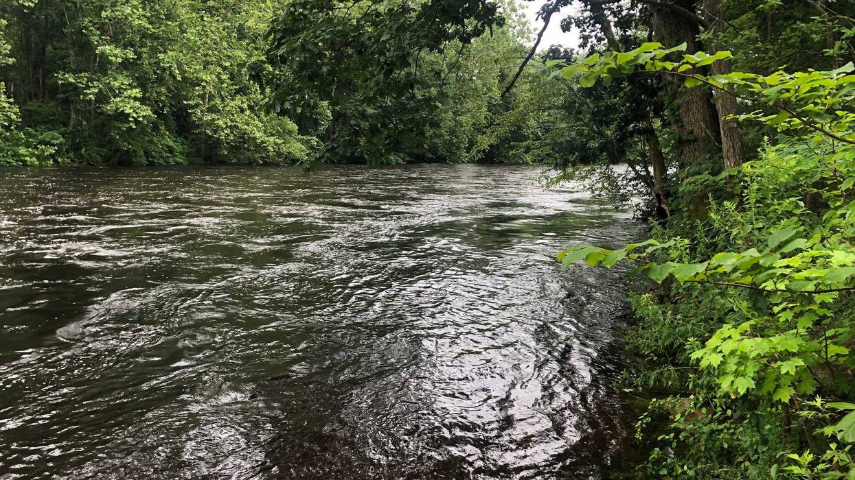 The Farmington River in Unionville, near the site where the bodies of two teenagers were recovered, 7/19/21.