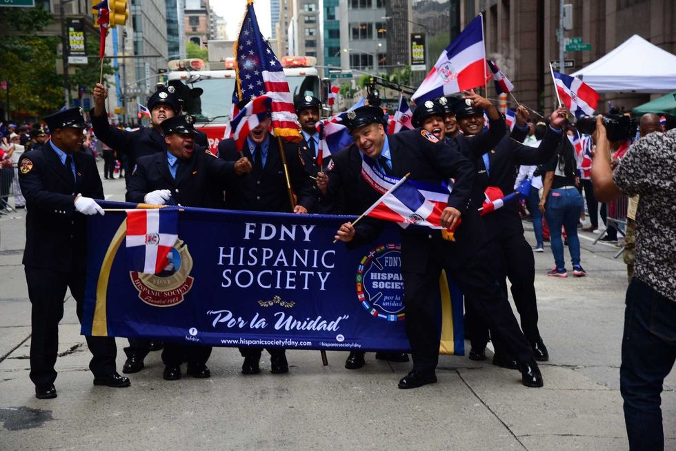 The FDNY Hispanic Society walks in the Dominican Day Parade on Aug. 8, 2021.