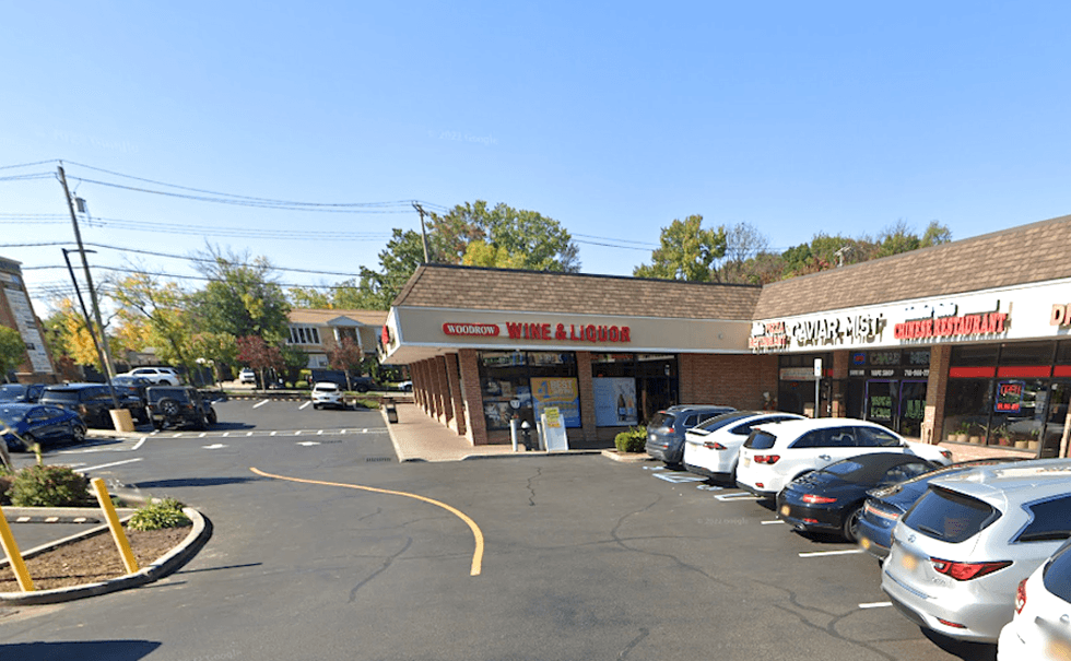 The Fiat was overturned outside a pizza shop at the Woodrow Village shopping mall on Rossville Avenue