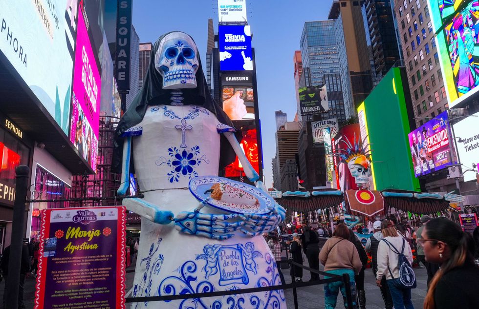 The figures "serve as a reminder of the beauty and reverence of life and death"