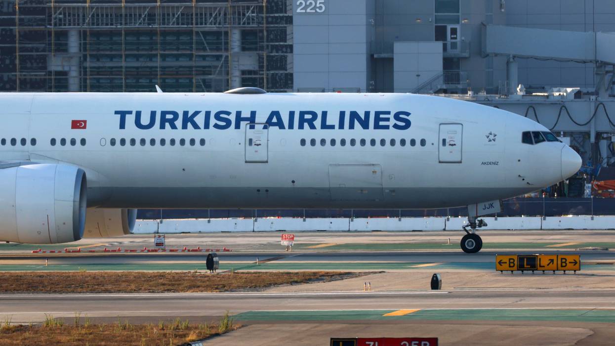 The flight landed at JFK Airport after the pilot died midflight, officials said