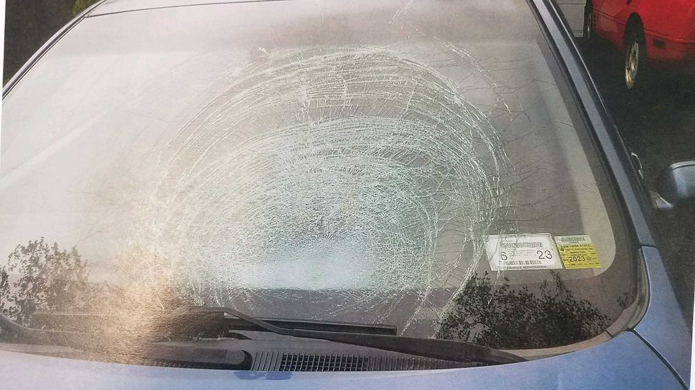 The force of the pumpkin shattered the windshield of the Ford Fusion