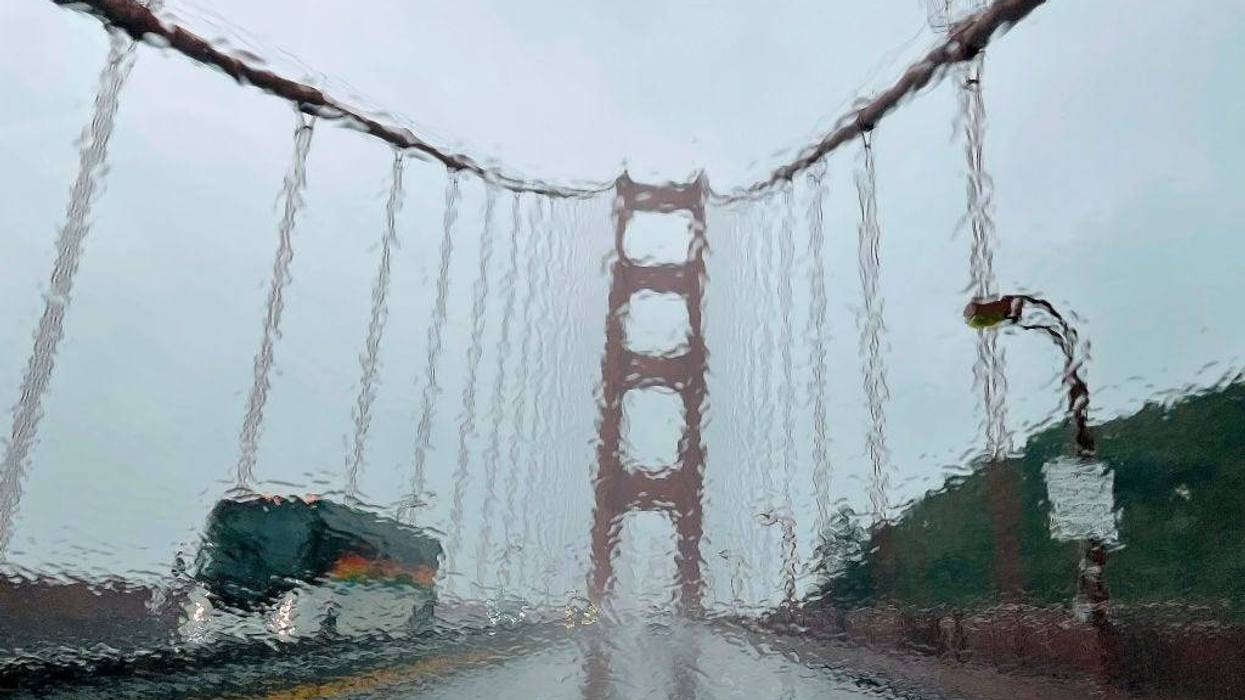 The Golden Gate Bridge is seen through a rain covered windshield on January 04, 2023 in San Francisco, California.