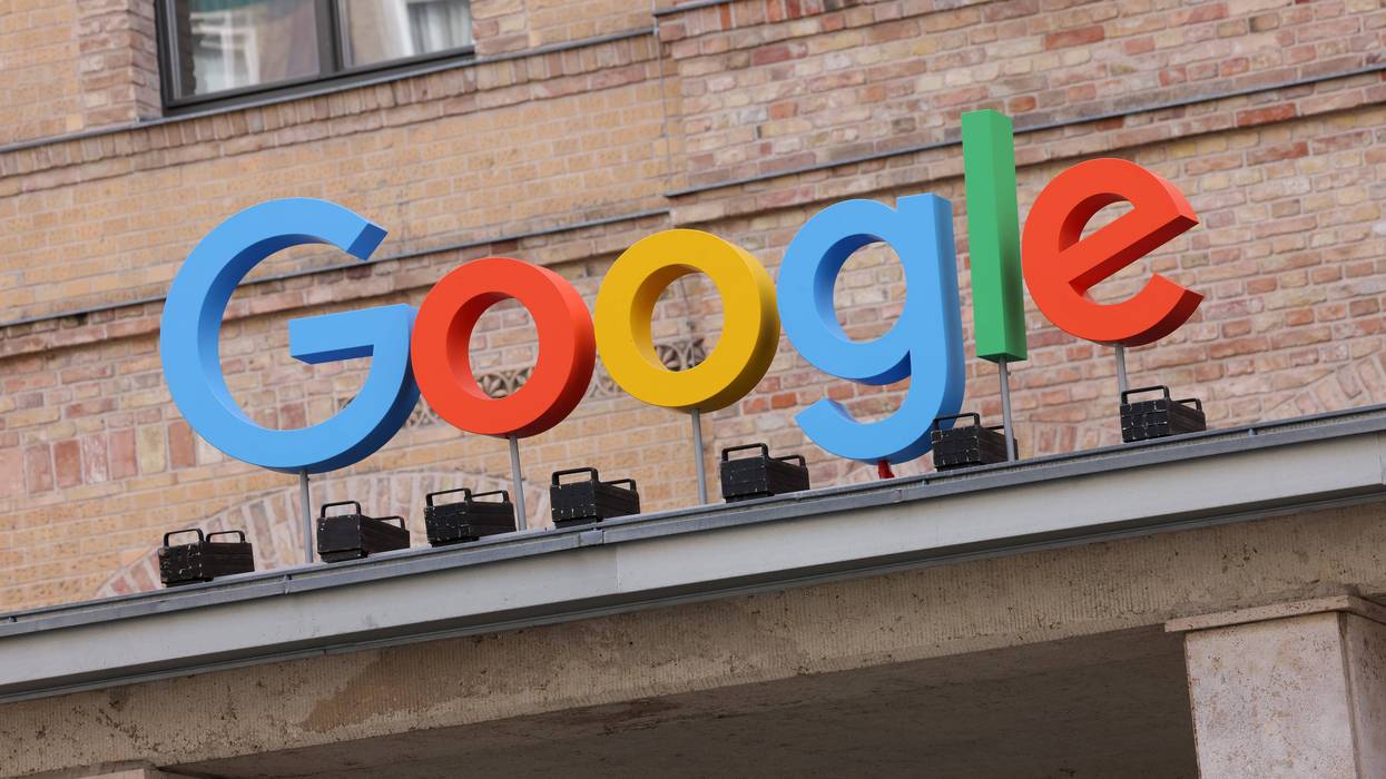 The Google corporate logo hangs outside the Google Germany offices in Berlin, Germany.