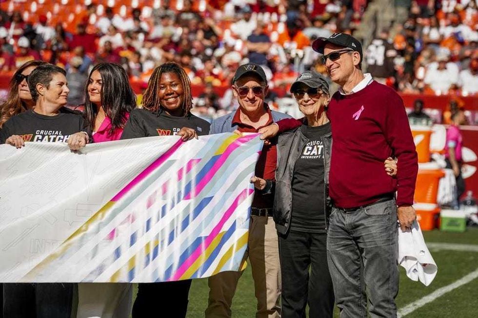 The Harris family join other cancer survivors on the field