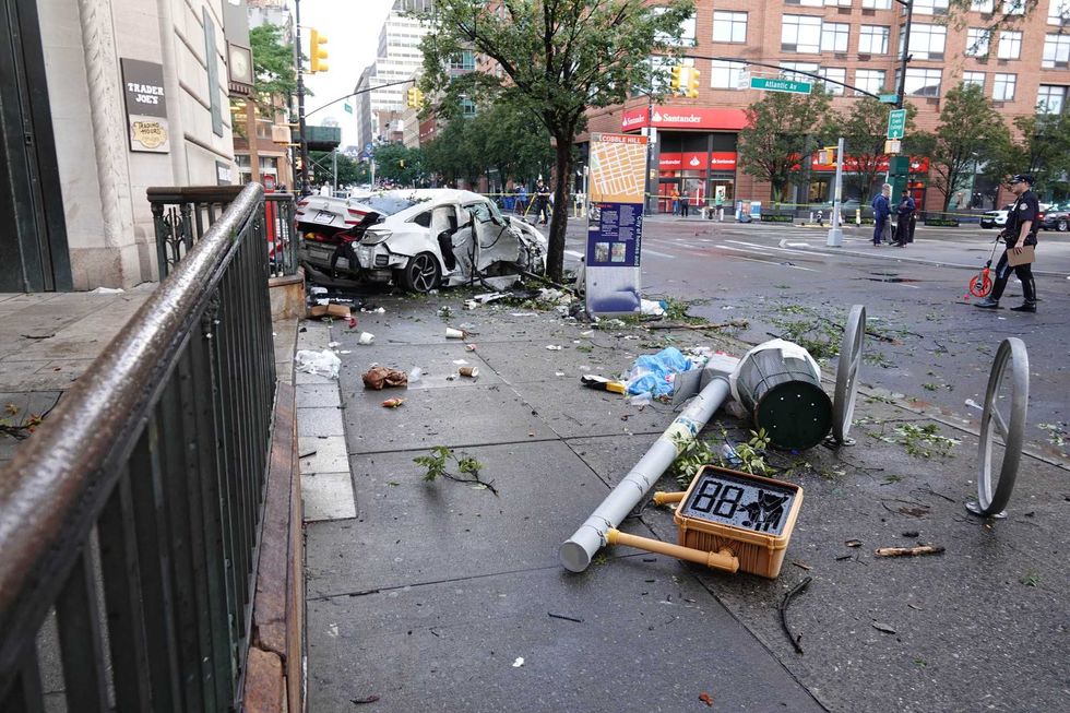 The Honda and a pedestrian crossing sign landed outside the Trader Joe